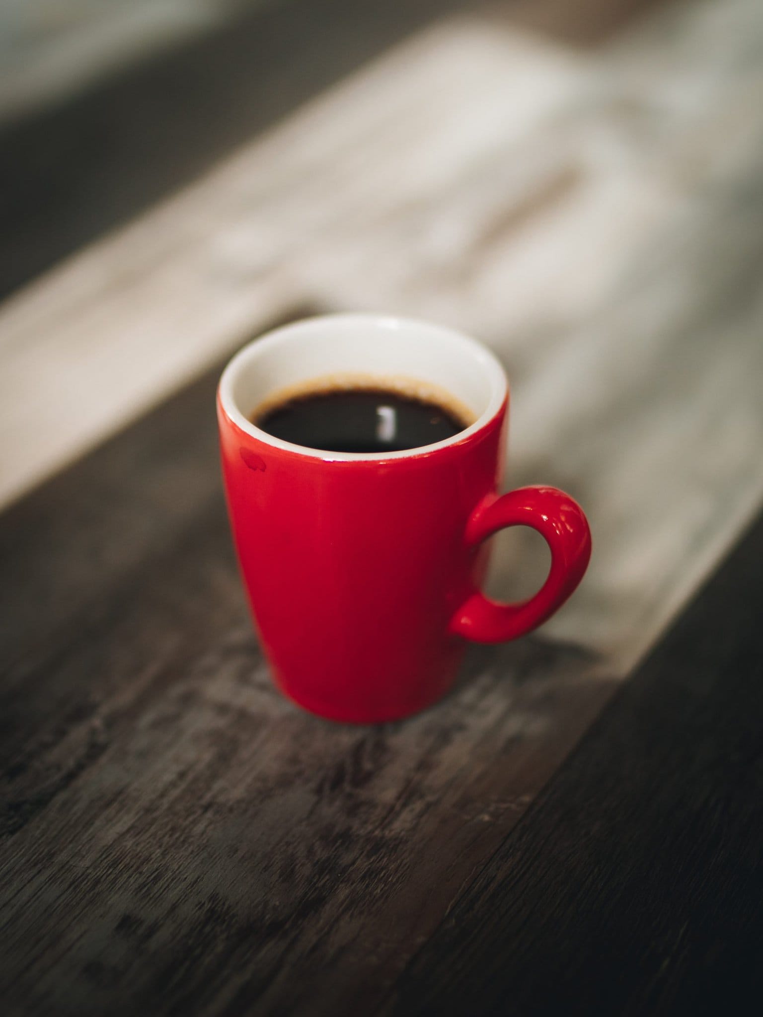 Red coffee cup VENTUREWRITE blog https://www.pexels.com/photo/selective-focus-photography-red-cup-of-coffee-2113129/
